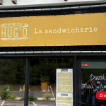 Bâches enseignes installées sur les façades de Hug’O.